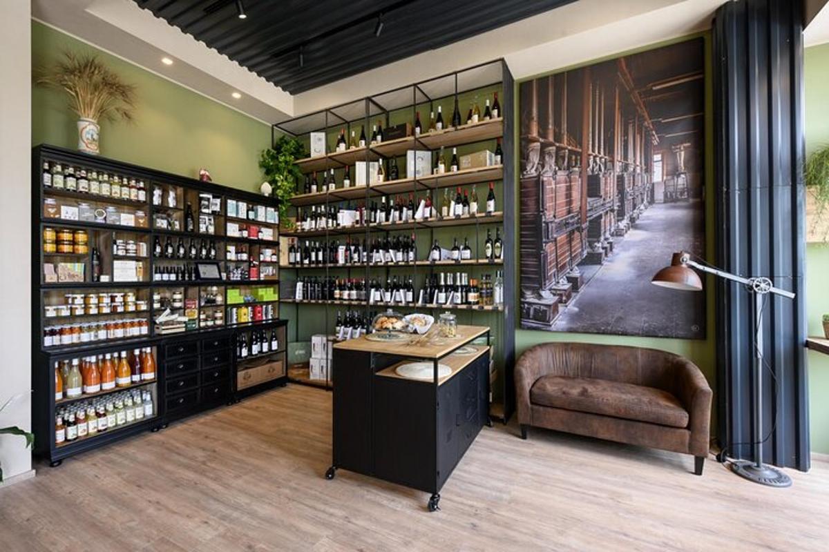 a liquor store with a chair and a desk in a room