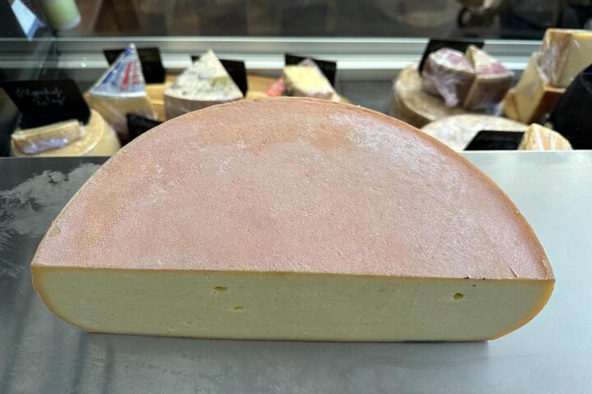 a cake sitting on top of a table with other desserts