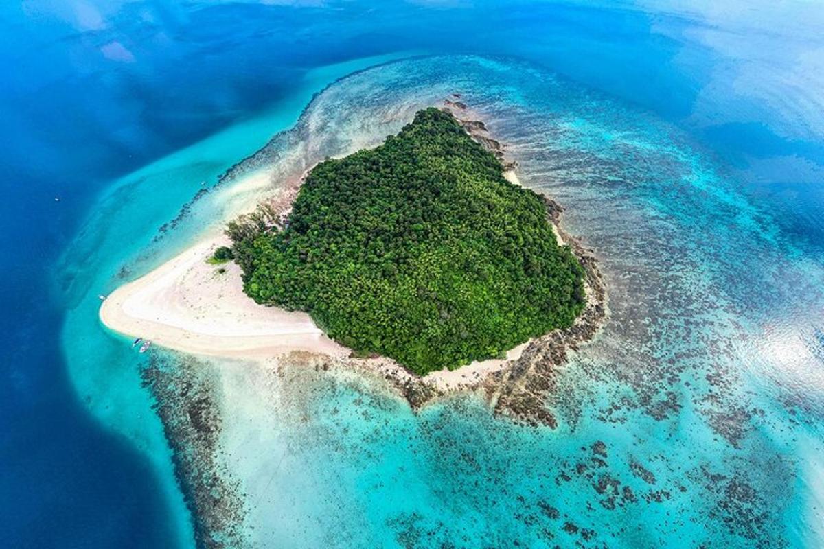 an aerial view of an island in the ocean