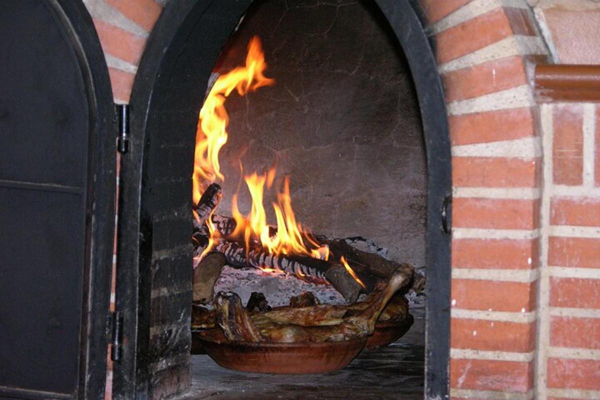 a fire oven with a bowl of food in it
