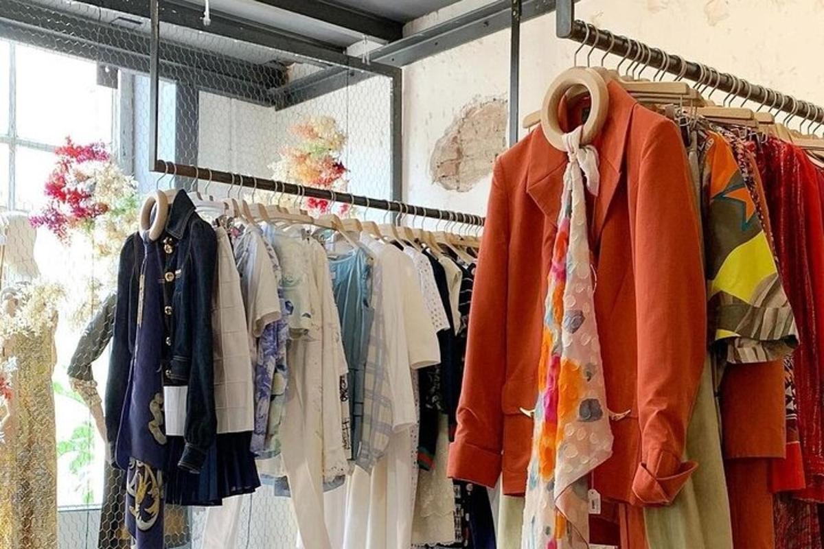 a rack of clothes in a clothing store