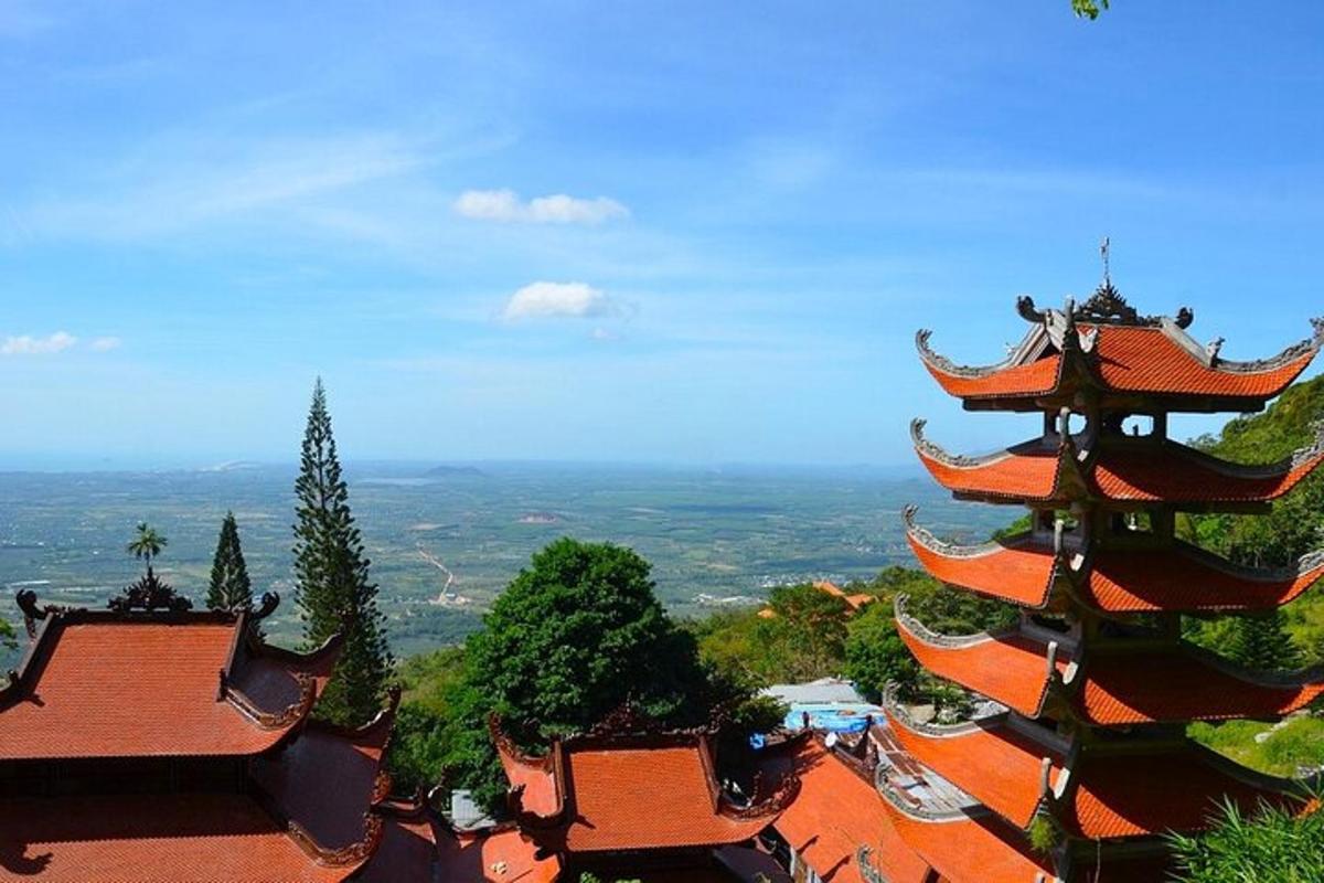 an overhead view of a pagoda with roofs and trees