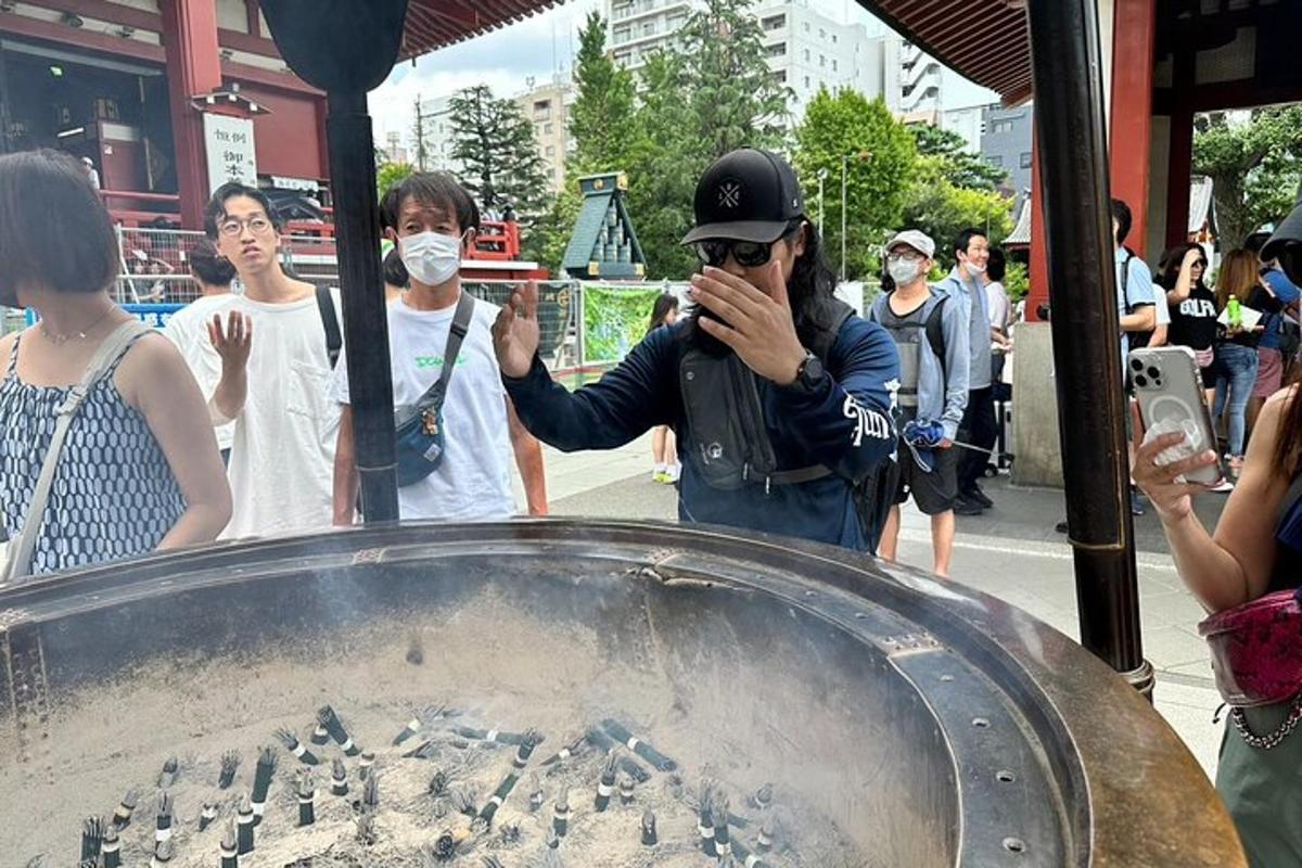 a man taking a picture of a group of people