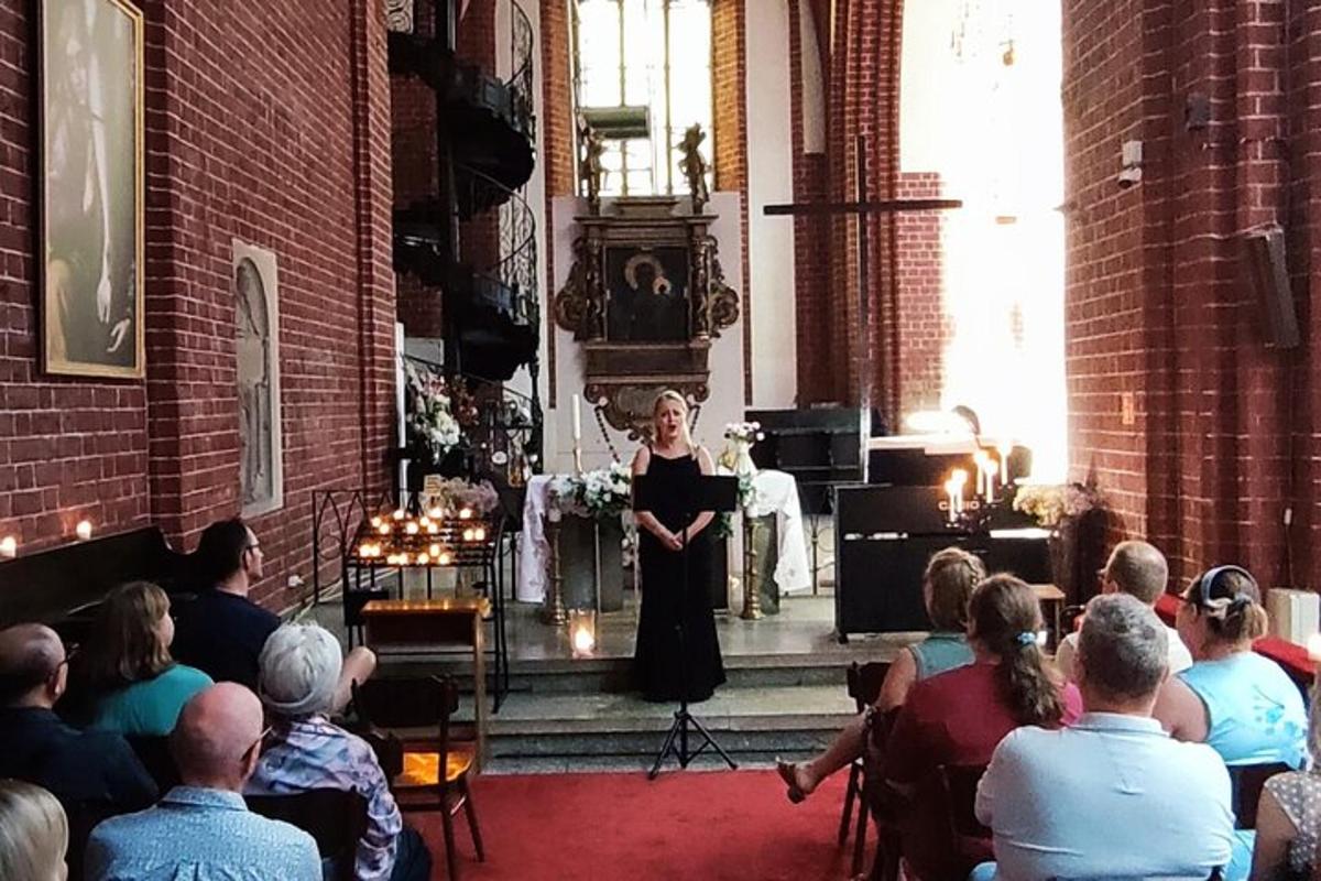 a woman standing in a room in a church