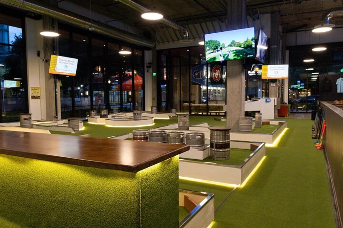 a large room with a counter and a tv