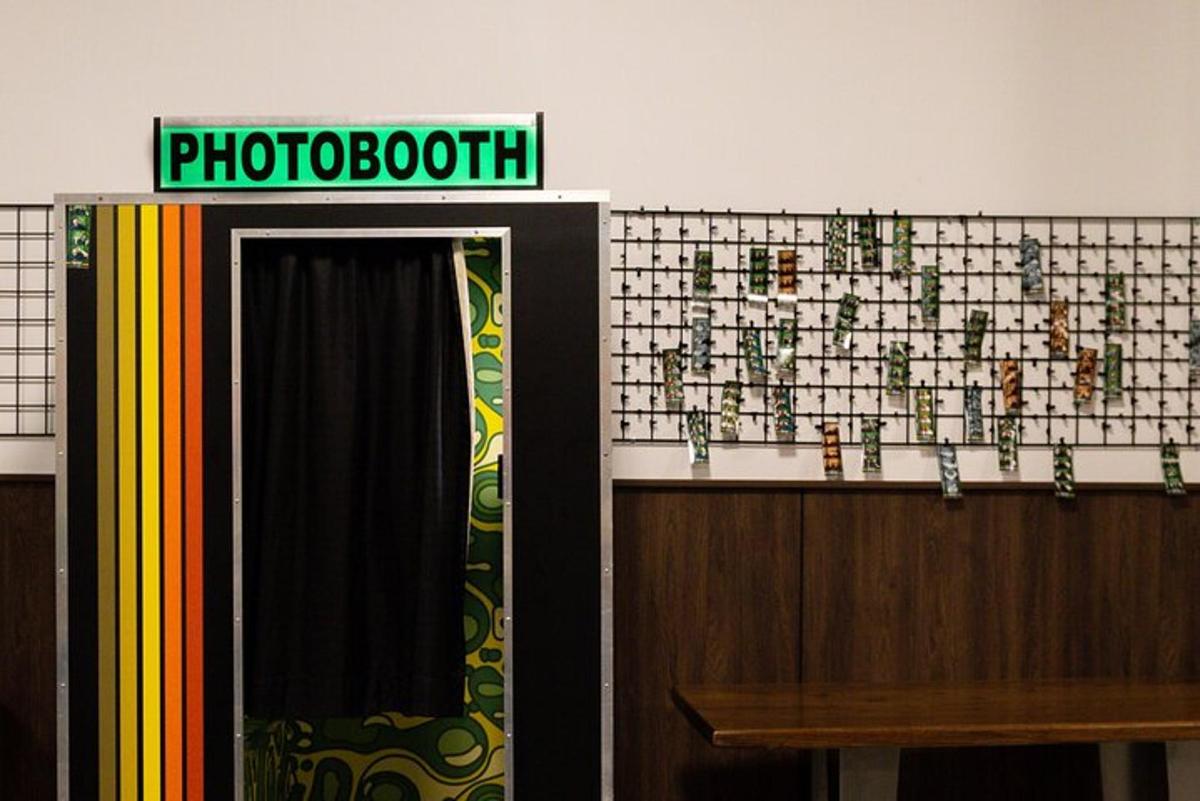 a store with a photo booth sign on the wall