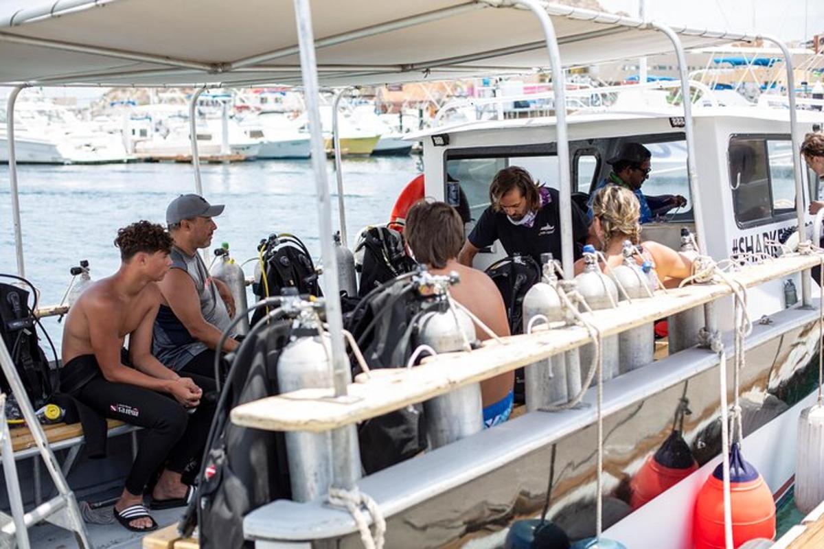 a group of people sitting on a boat