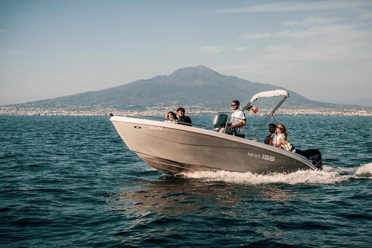 a group of people on a boat in the water