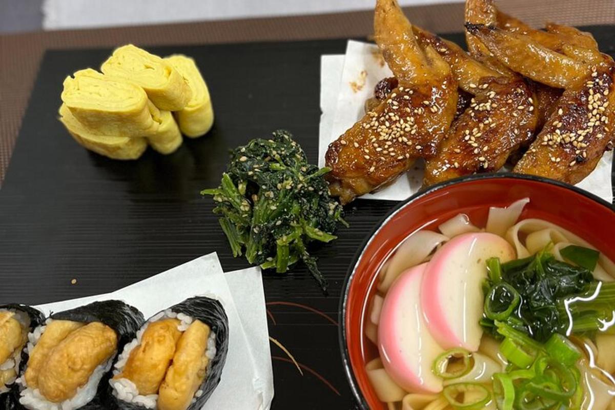 a table topped with a bowl of soup and some food