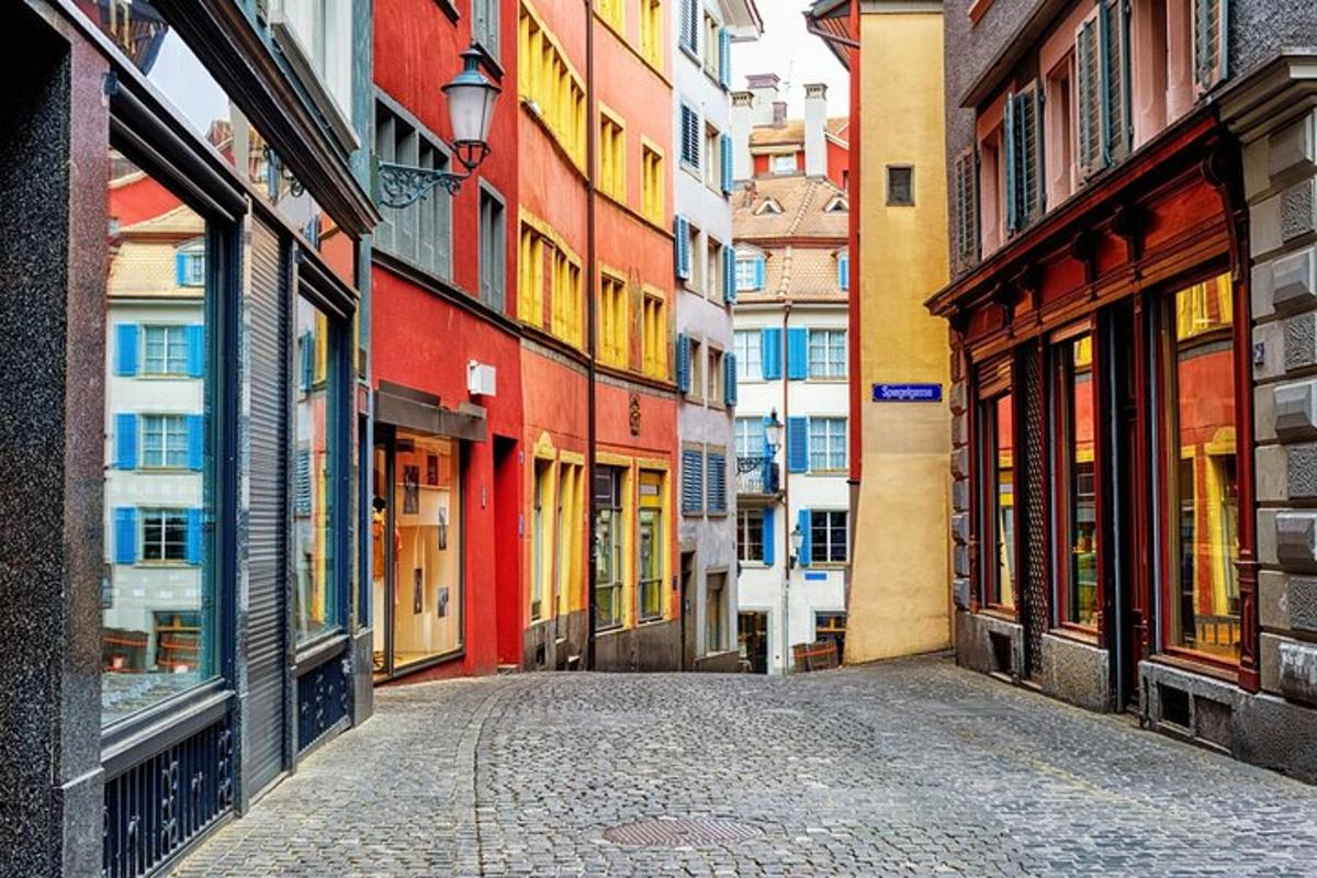 an empty street in a city with colorful buildings