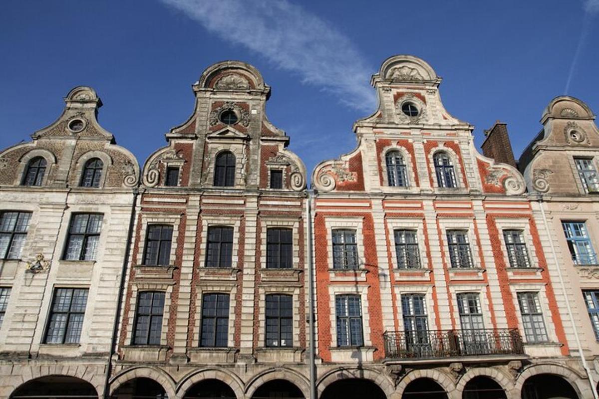 a large brick building with two towers on top