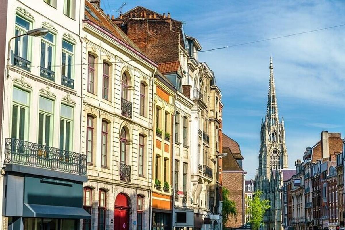 a group of buildings on a city street with a church