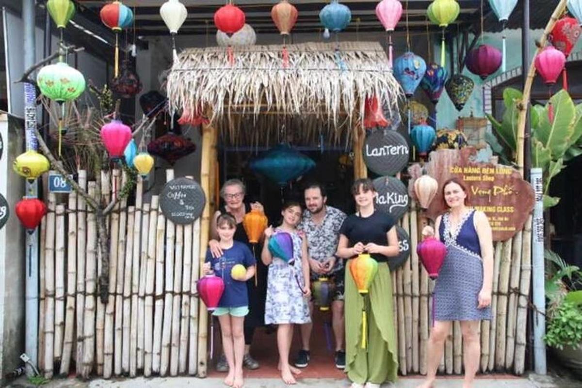a group of people standing in front of a gate