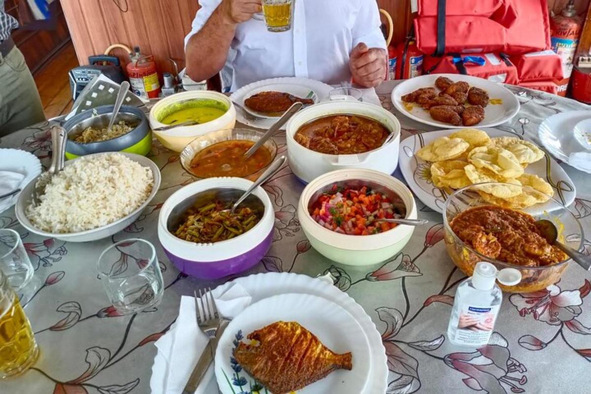a table with many different dishes of food on it