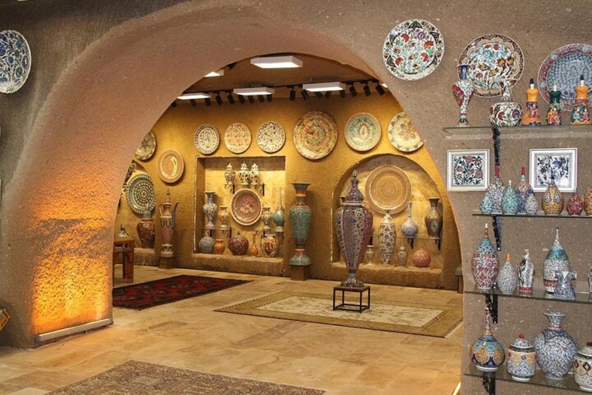 a store with plates and vases on the wall