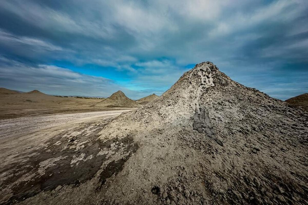 a pile of dirt in the middle of a desert