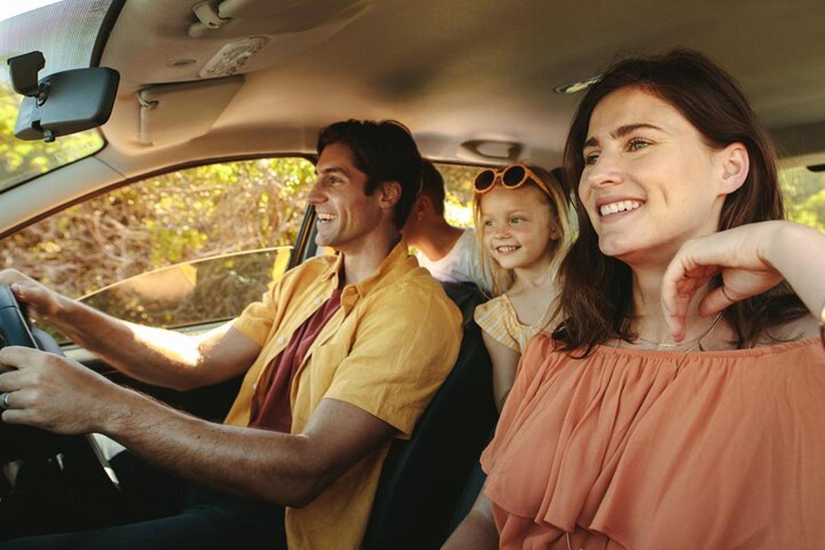 a group of people riding in a car