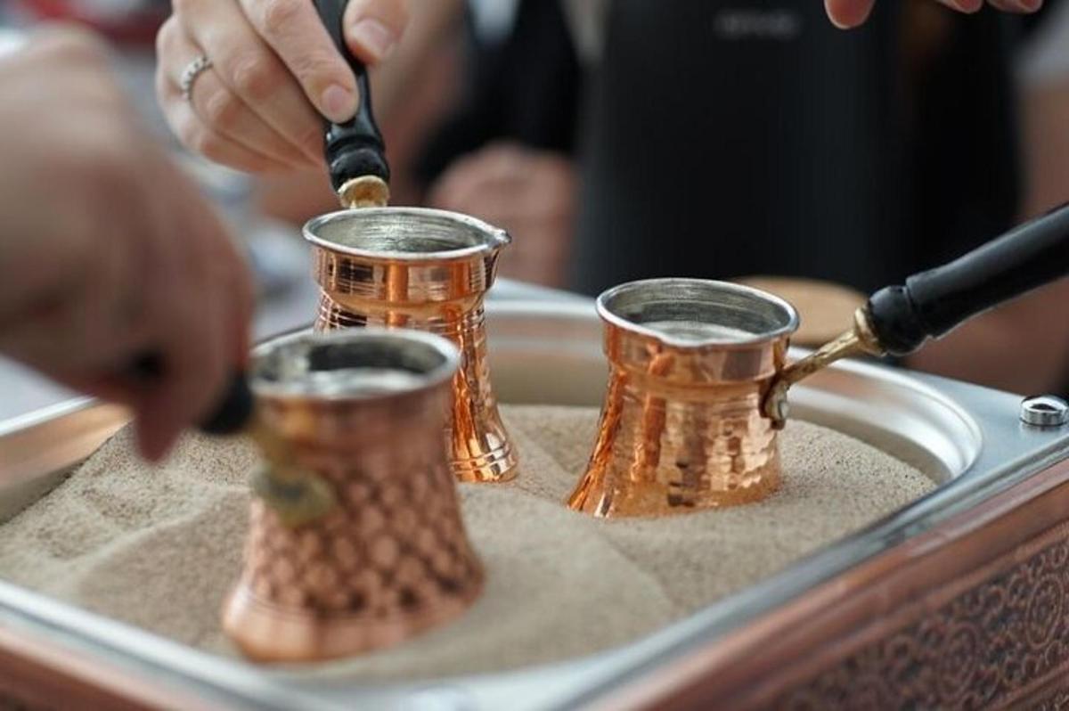 a tray with three metal drinking cups on it