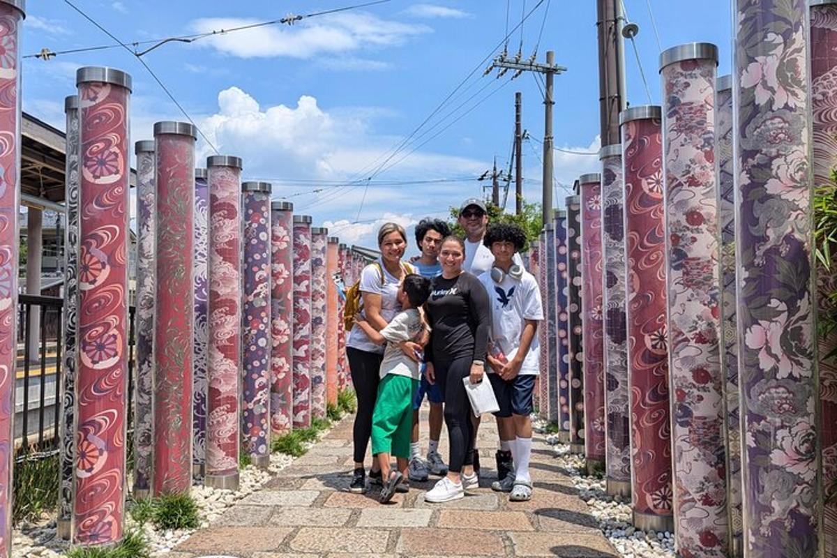 a group of people walking through a fence