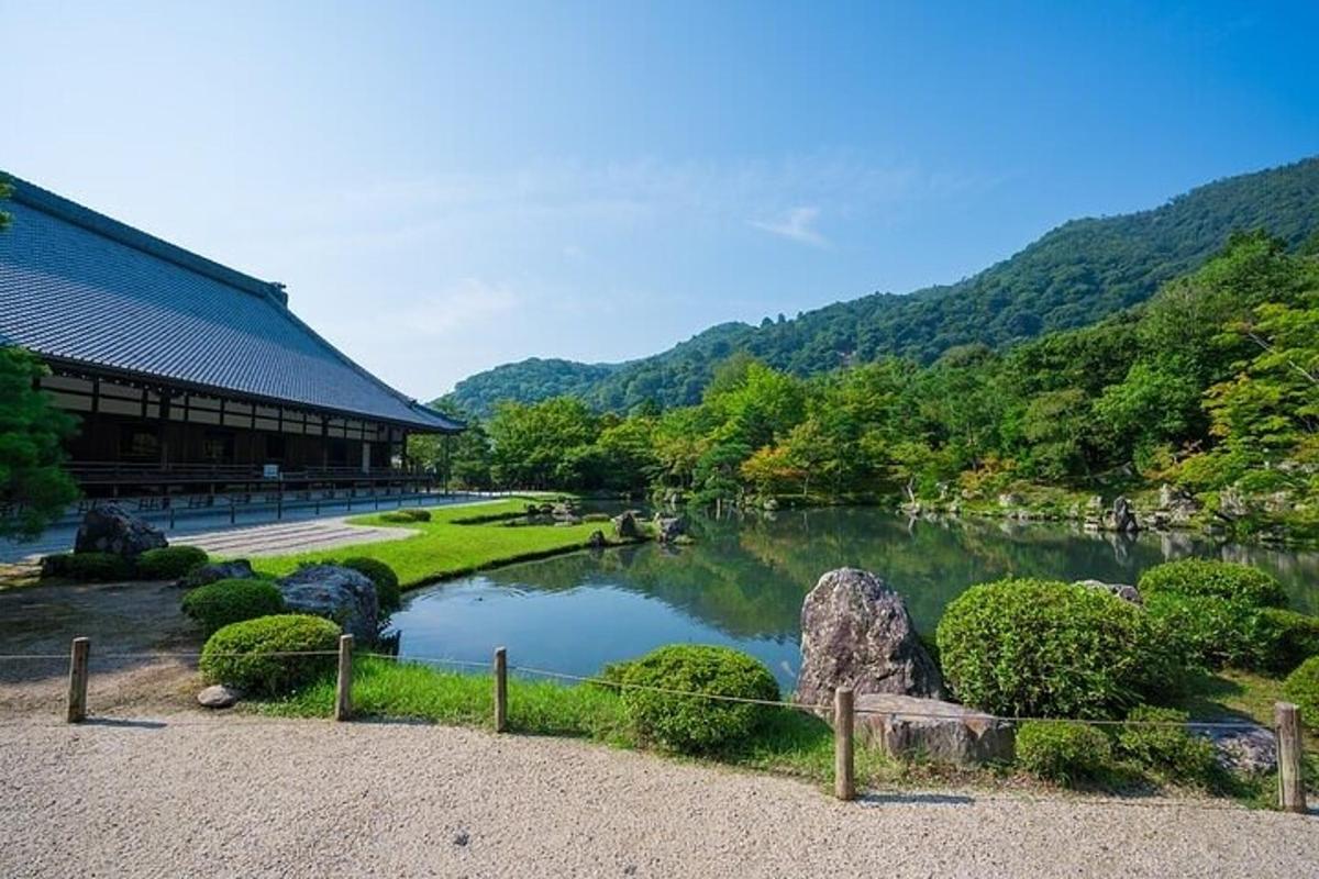 a pond in front of a building next to a building