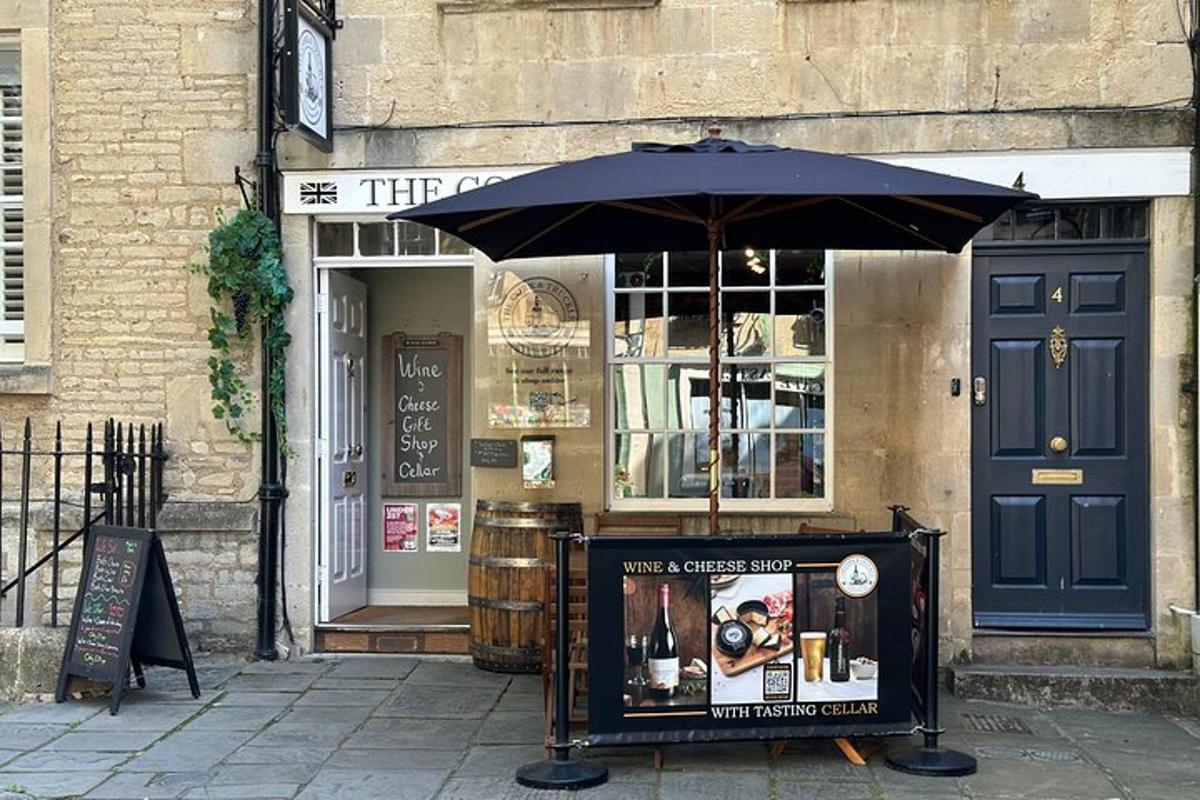 a store with an umbrella in front of a building