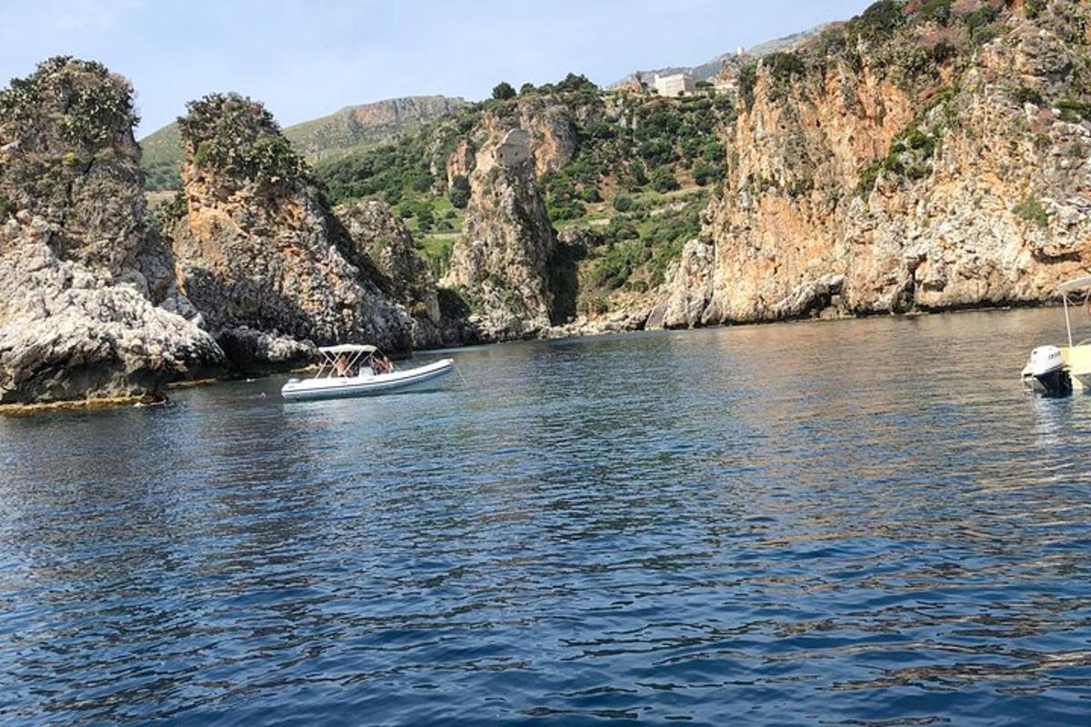 a group of people in a boat on the water