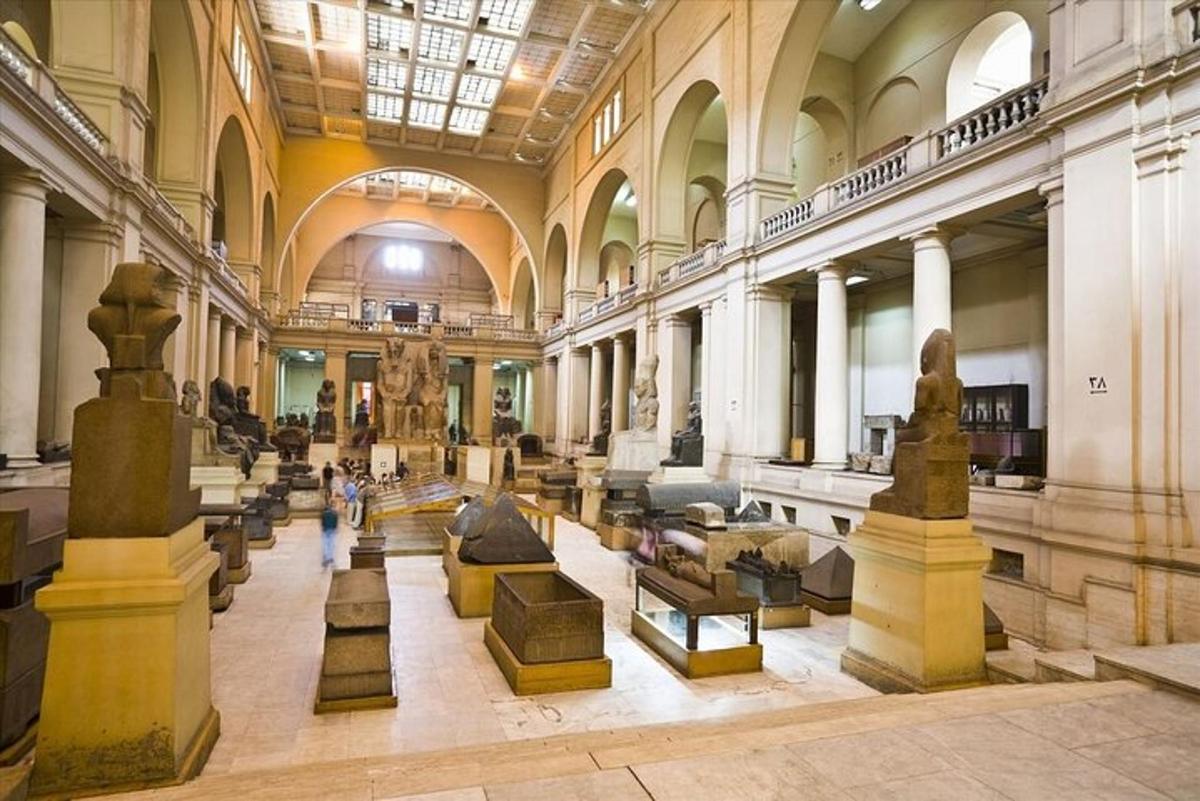 a museum with a lot of statues in a building