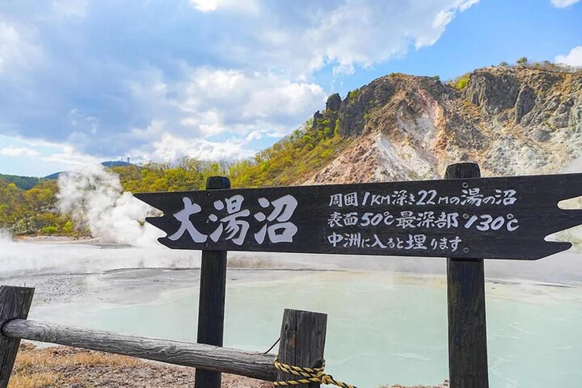 a sign with writing on it next to a body of water
