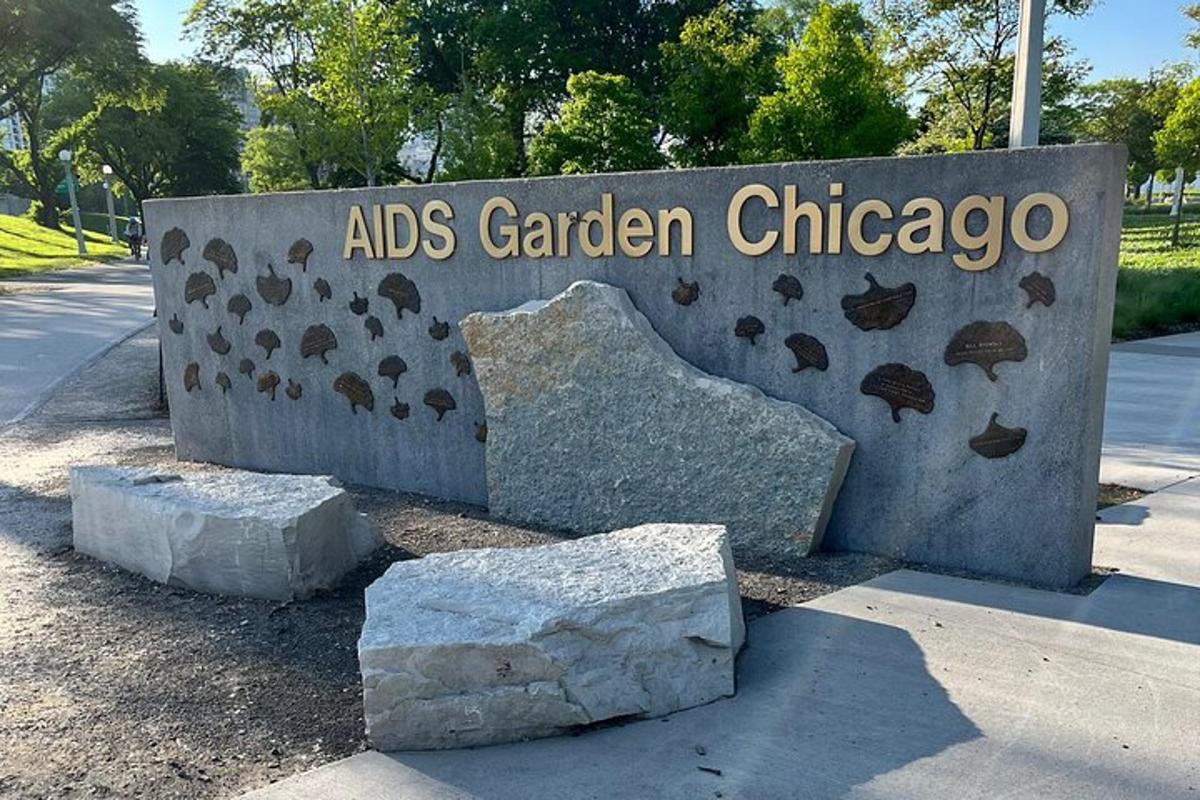 cedule s nápisem „pomáhá zahradě v Chicagu s kameny“