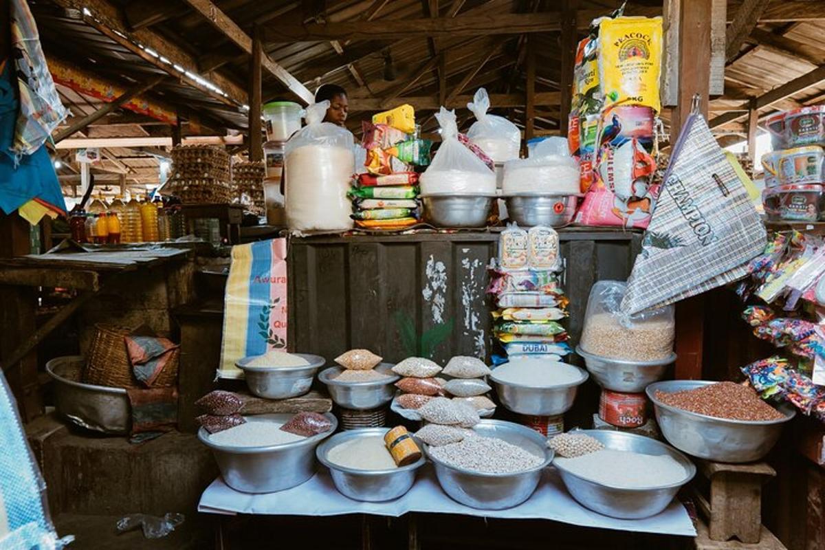 a market with bowls and other food items on a table