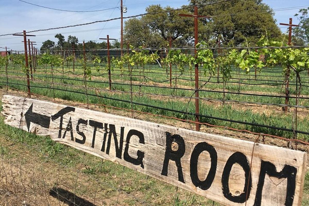 ajoining room sign with a dog on a fence