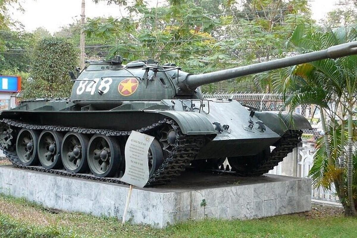 a tank is on display in a park