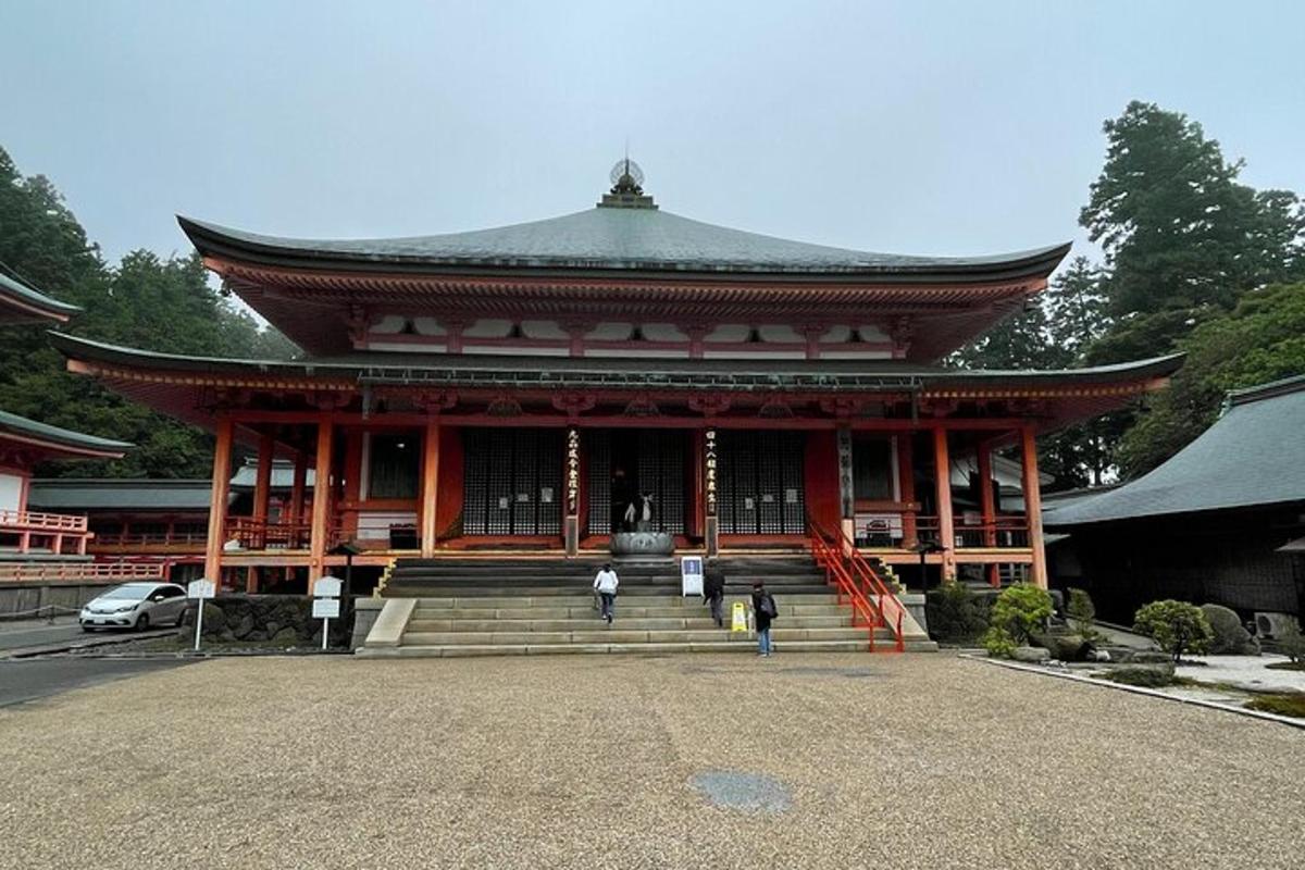 a large building with people walking in front of it