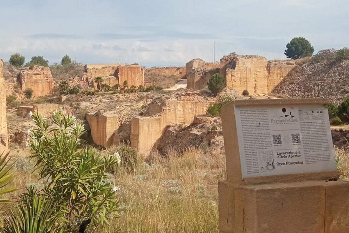 a sign in the middle of a canyon