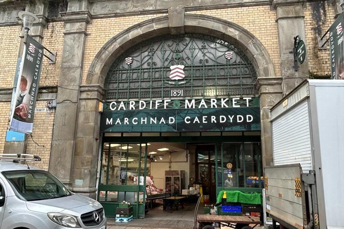 a store front of a building with a car parked outside