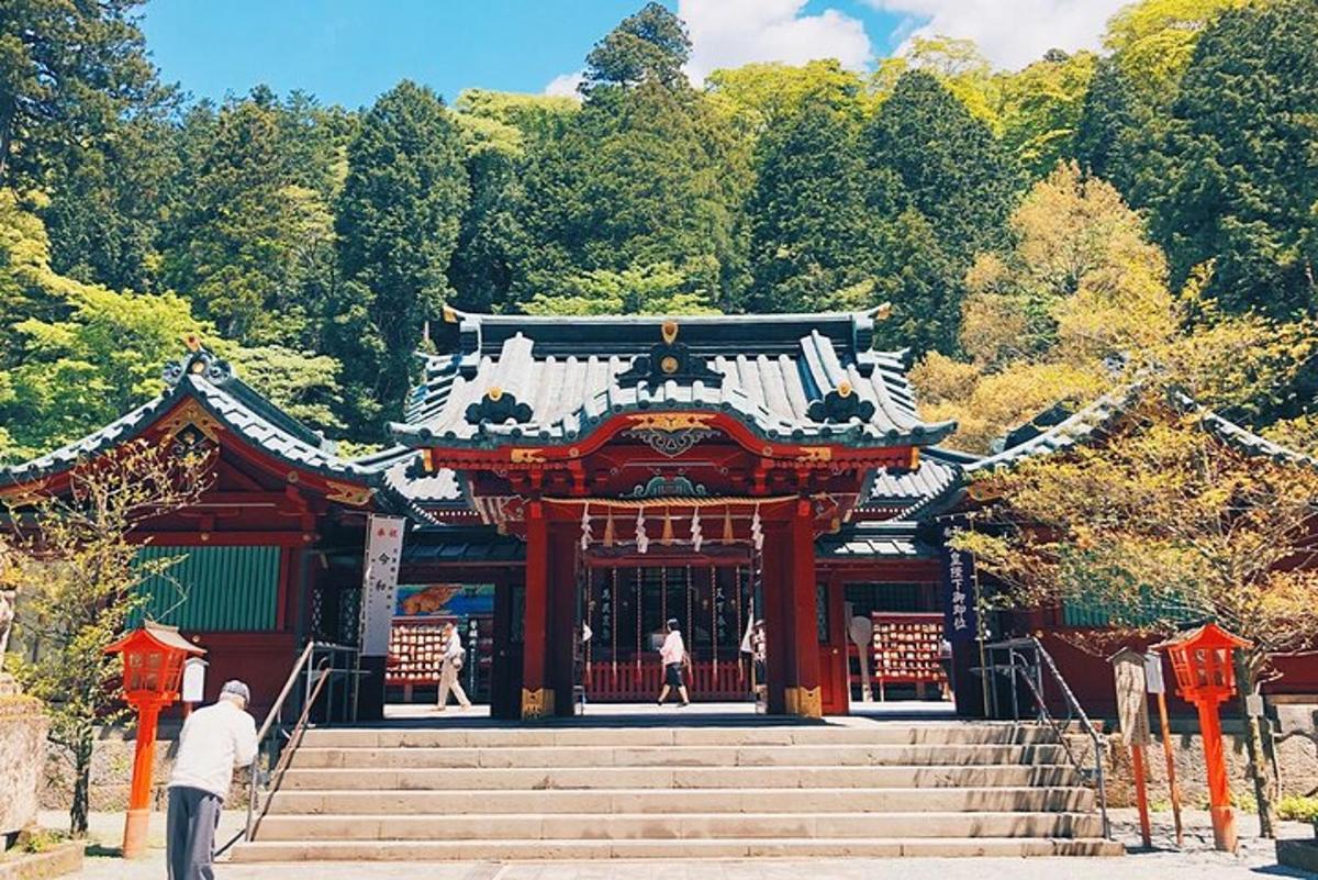 a person standing in front of a temple