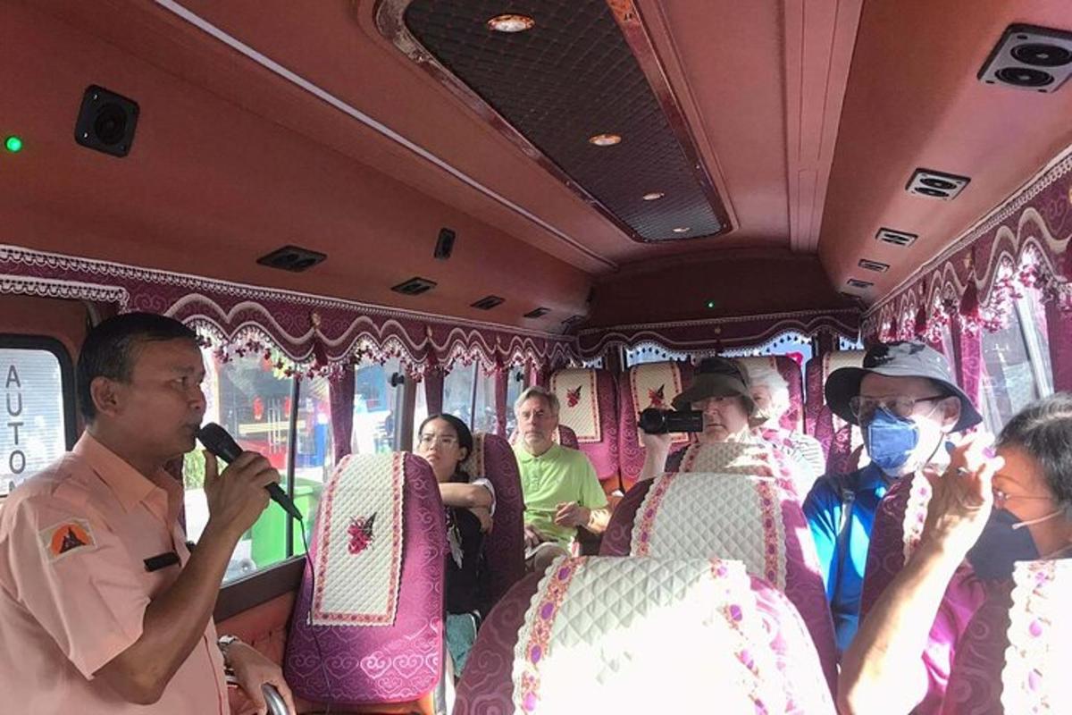 a group of people sitting on a bus