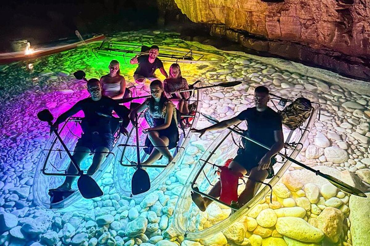 a group of people in a boat in a river