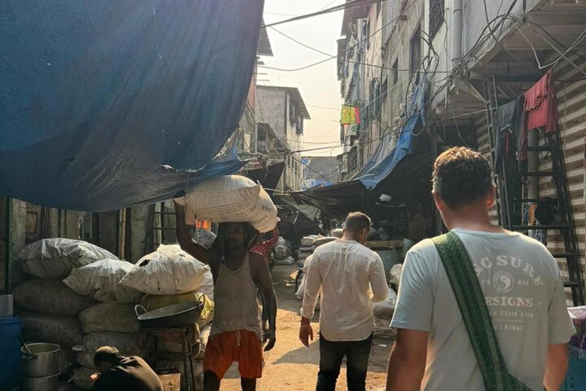 a group of men walking down a street