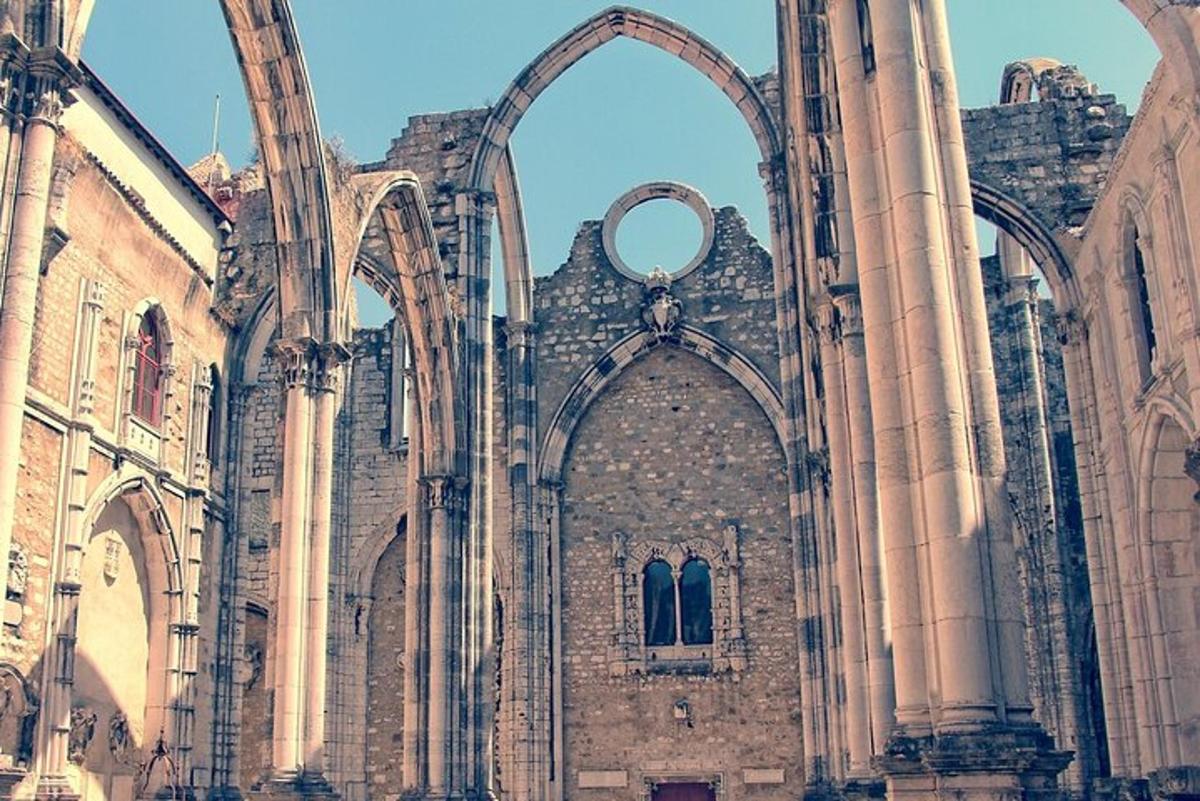 a large stone building with an archway in it