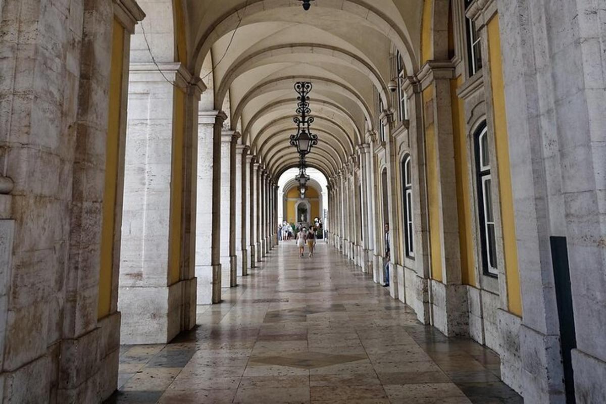 an empty hallway of a building with an arcade