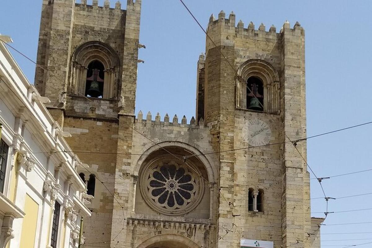 an old building with a tower with a clock on it