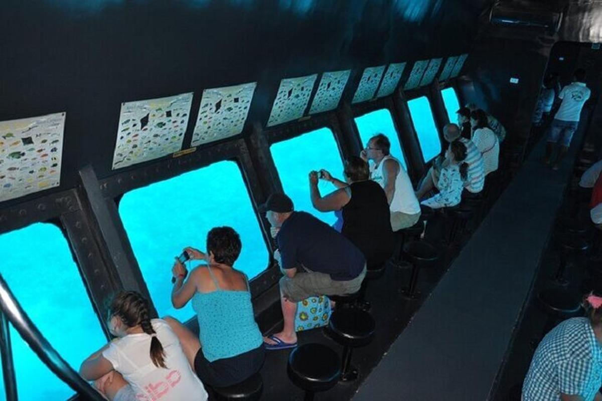 a group of people on an airplane looking at the water