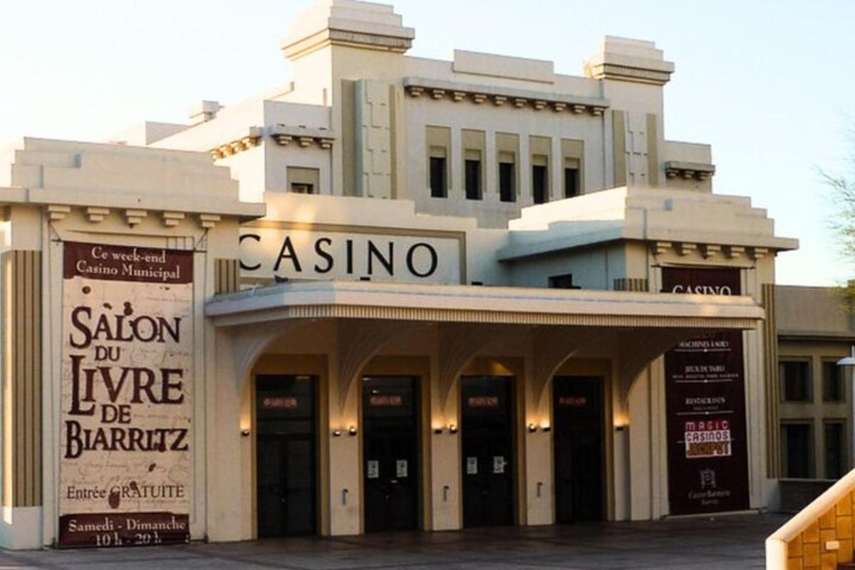 a large white building with a sign on it