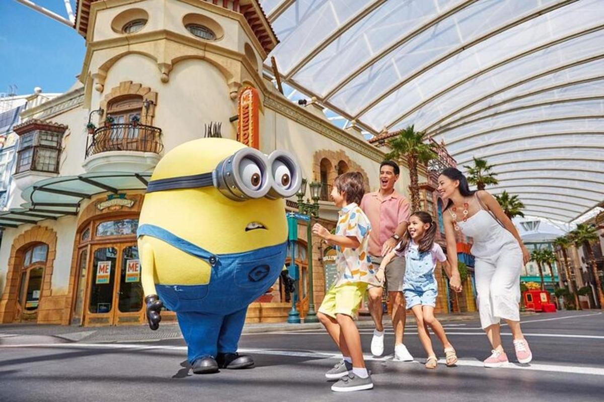 a group of people crossing a street with a minion