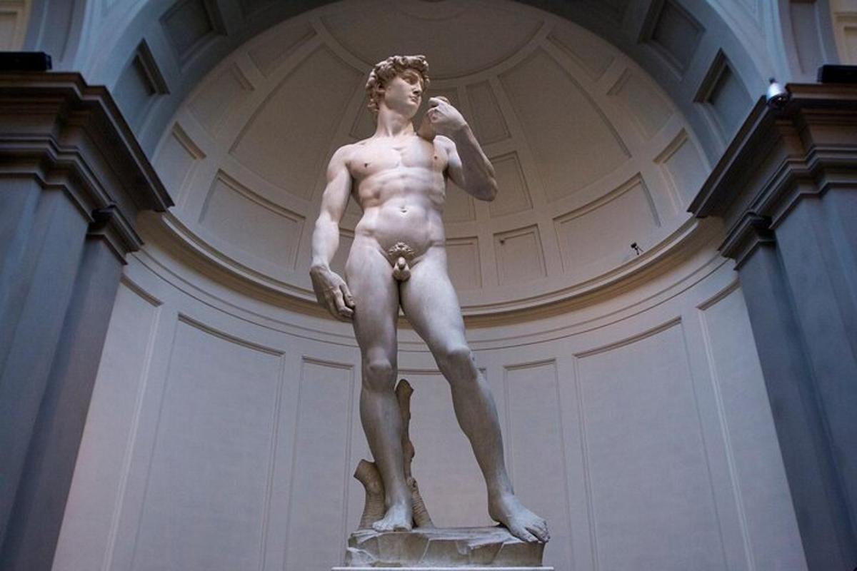 a statue of a man standing in a building