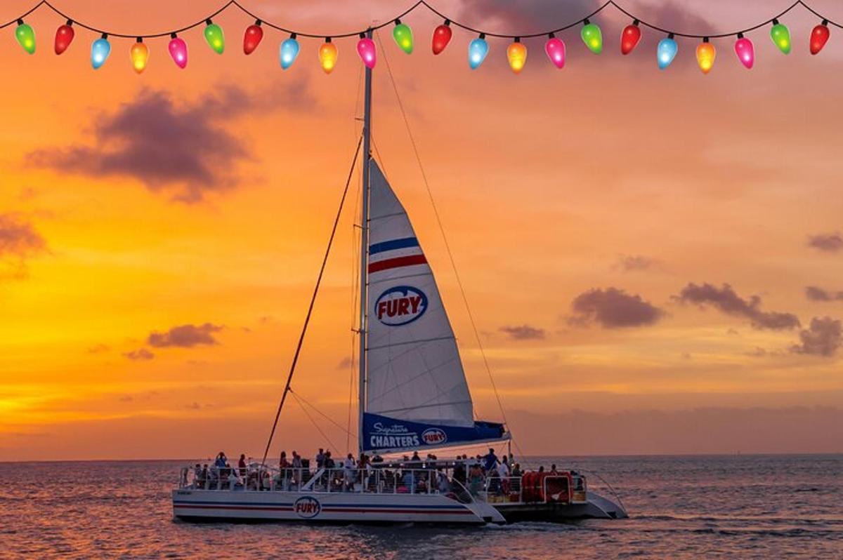 un gruppo di persone su una barca a vela nell'oceano