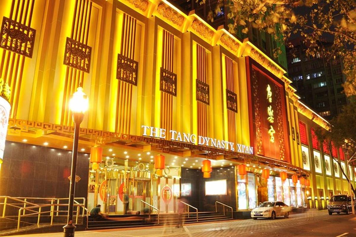 a large yellow building with a sign on it