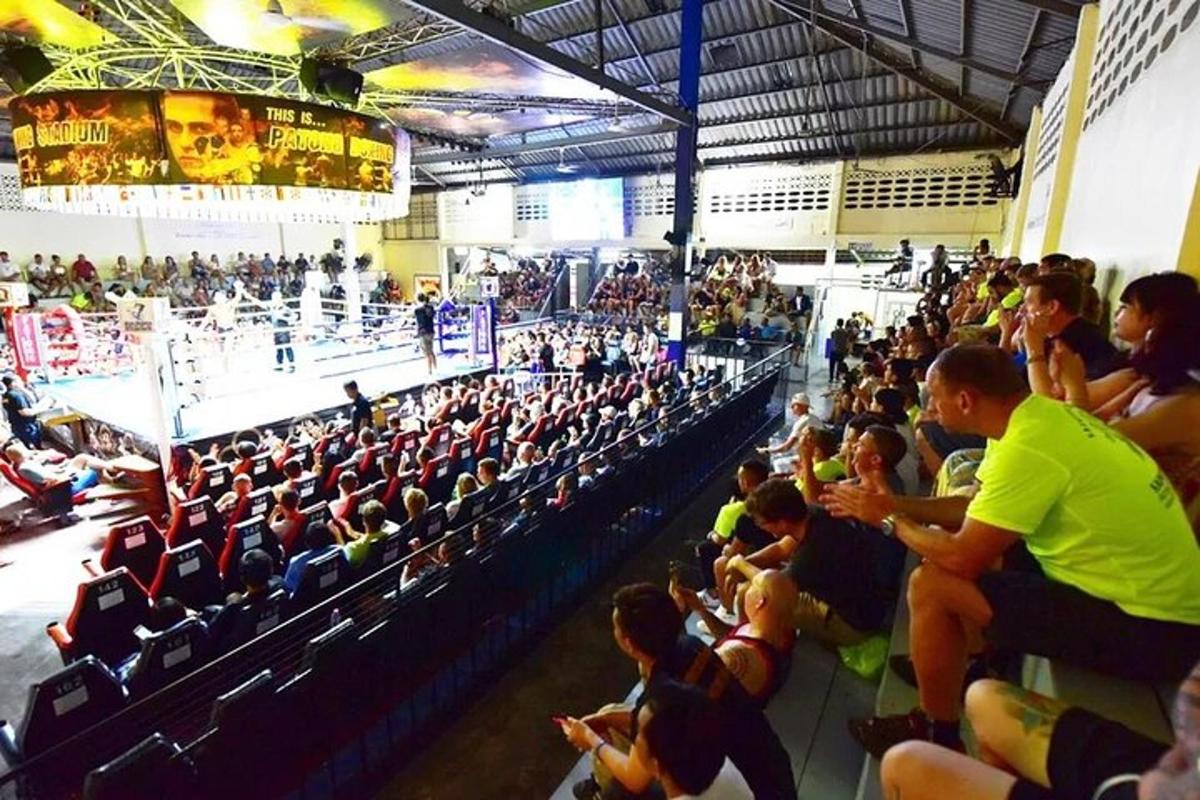 a large crowd of people sitting in an auditorium