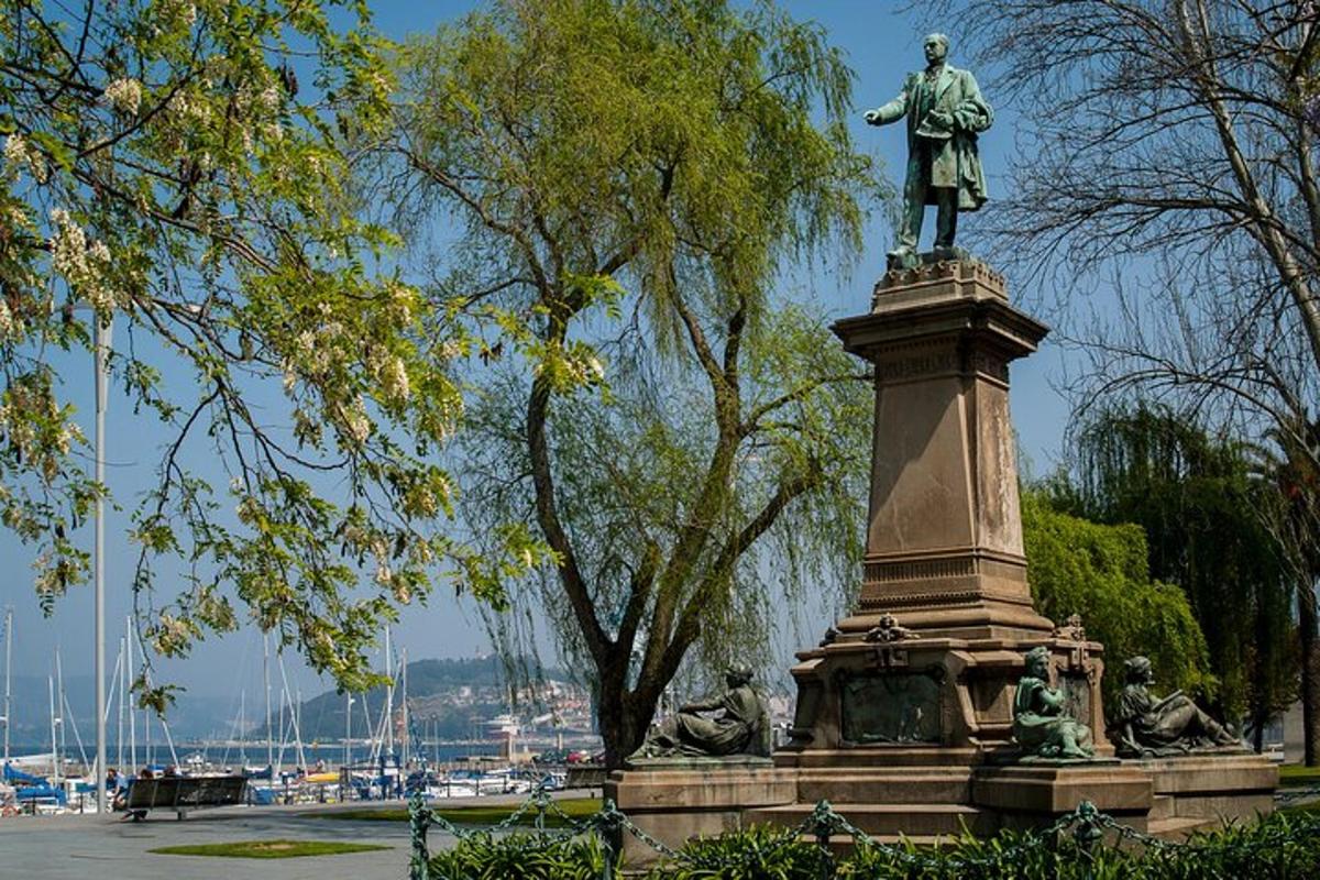 a statue of a man standing on top of a monument
